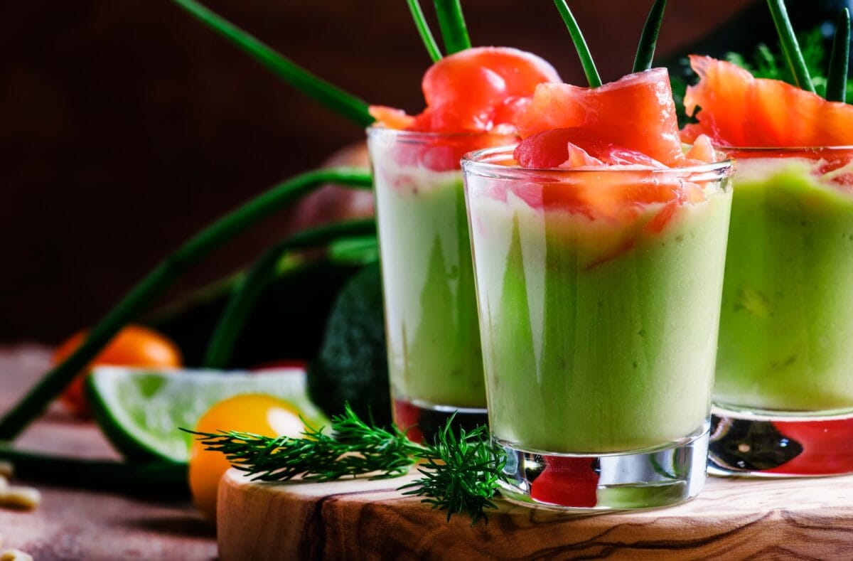 Appetizer with smoked salmon and avocado mousse, served in glasses