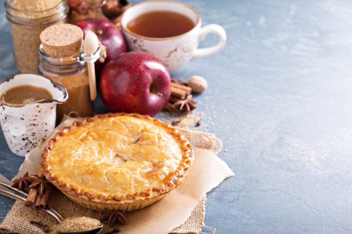 Apple pie with caramel syrup and cinnamon