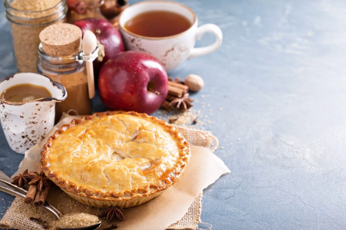 Apple pie with caramel syrup and cinnamon