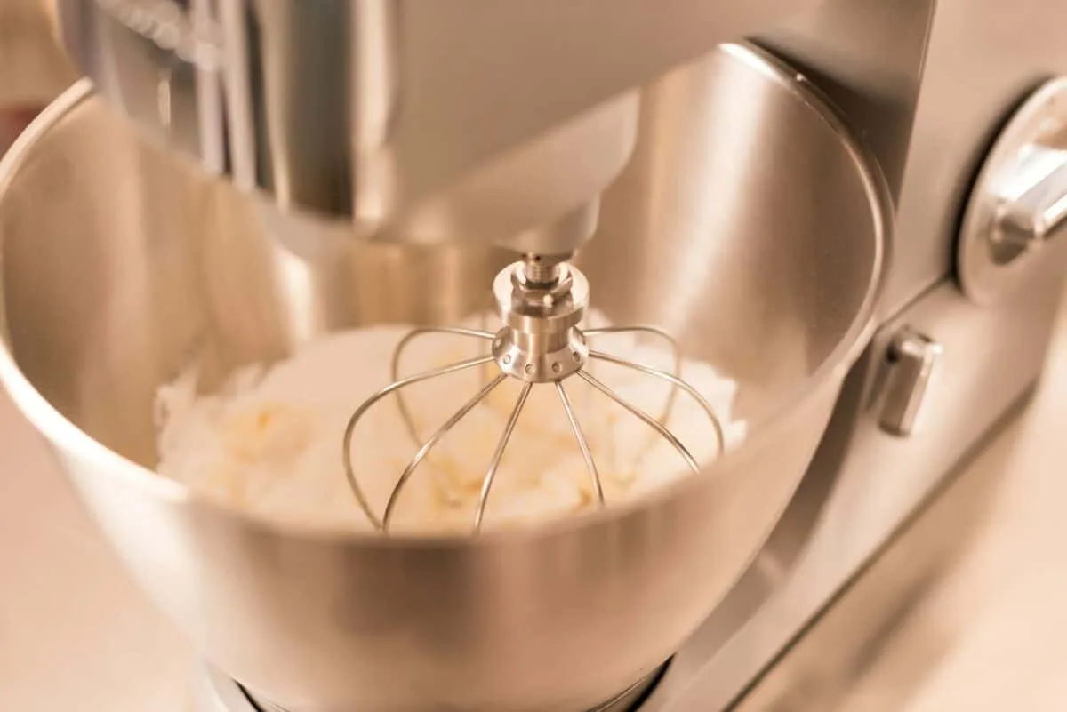 close up view of food processor whipping cream