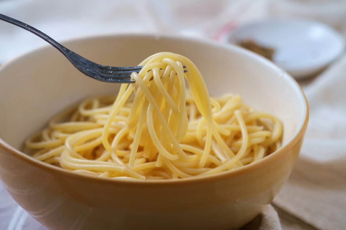 Cooked pasta in the ceramic bowl