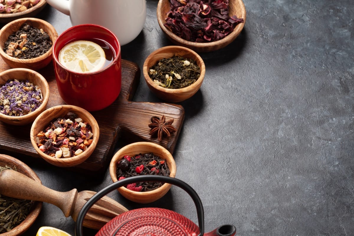 Various dried tea and teapot