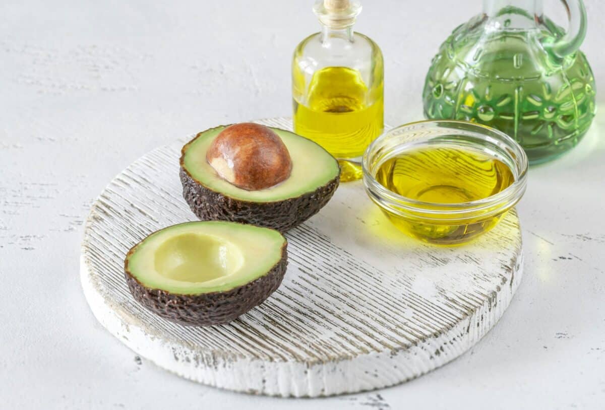 Fresh avocado with avocado oil