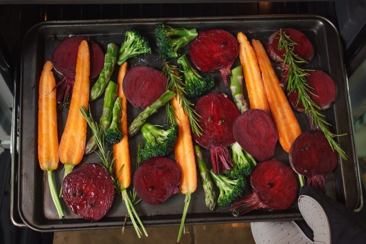 Fresh vegetables for roasting on baking tray