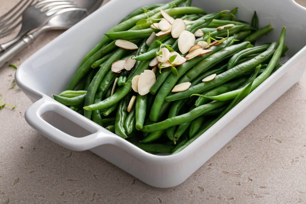 Green beans in a baking dish with slivered almonds, side dish idea
