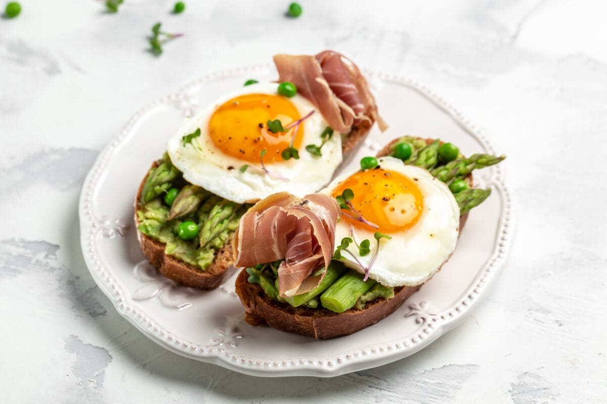 Grilled Toast witch Asparagus, Poached egg, bacon jamon, ham, prosciutto