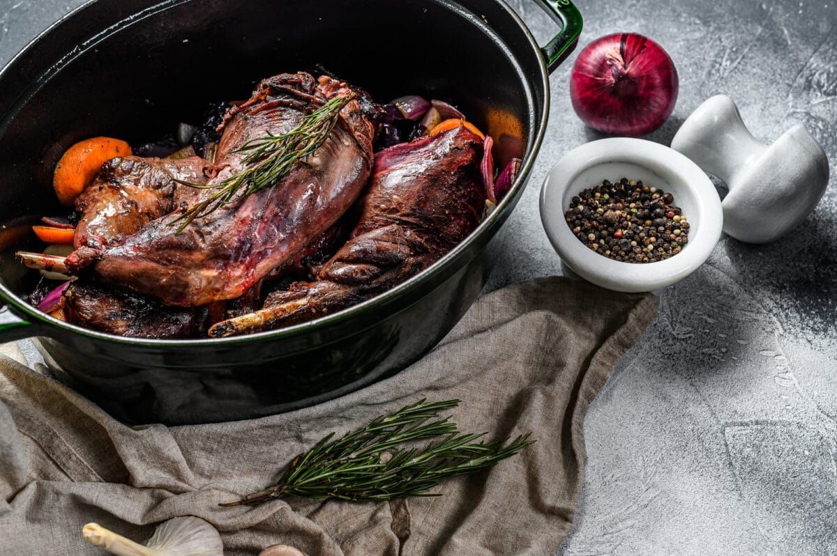 Rabbit with Vegetable in White Wine Sauce, Stewpot. Organic farm meat. Cooking stew. Top view