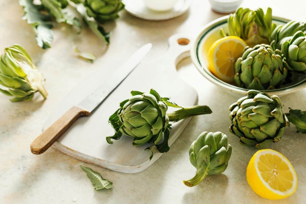 Raw artichokes and lemons