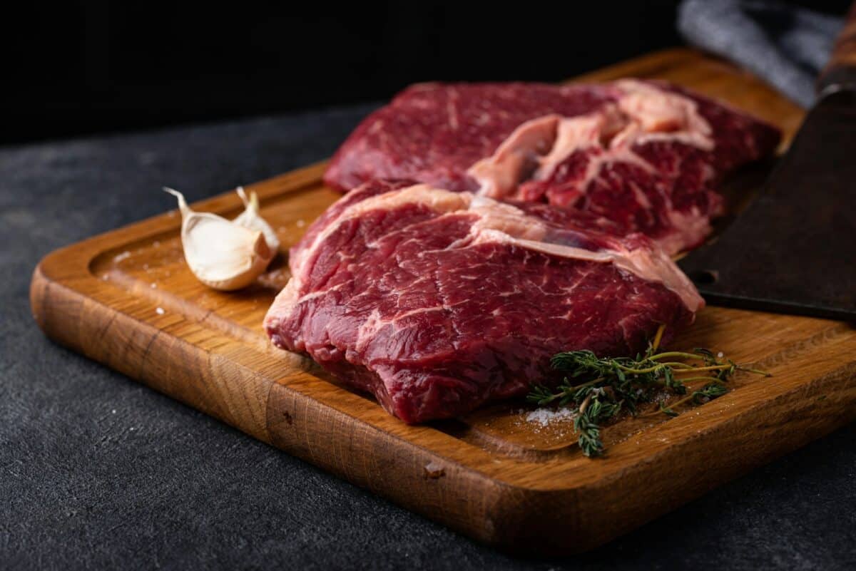Raw uncooked rib eye steak