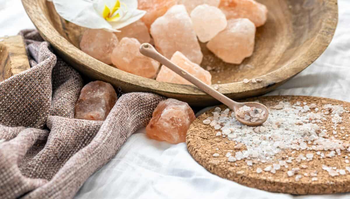 Spa composition with sea salt and orchid flowers.