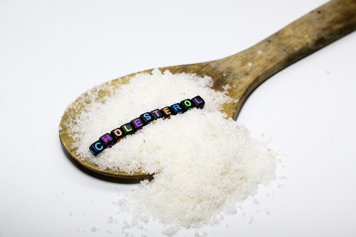 sucre dans une bouffée avec le mot cholestérol.