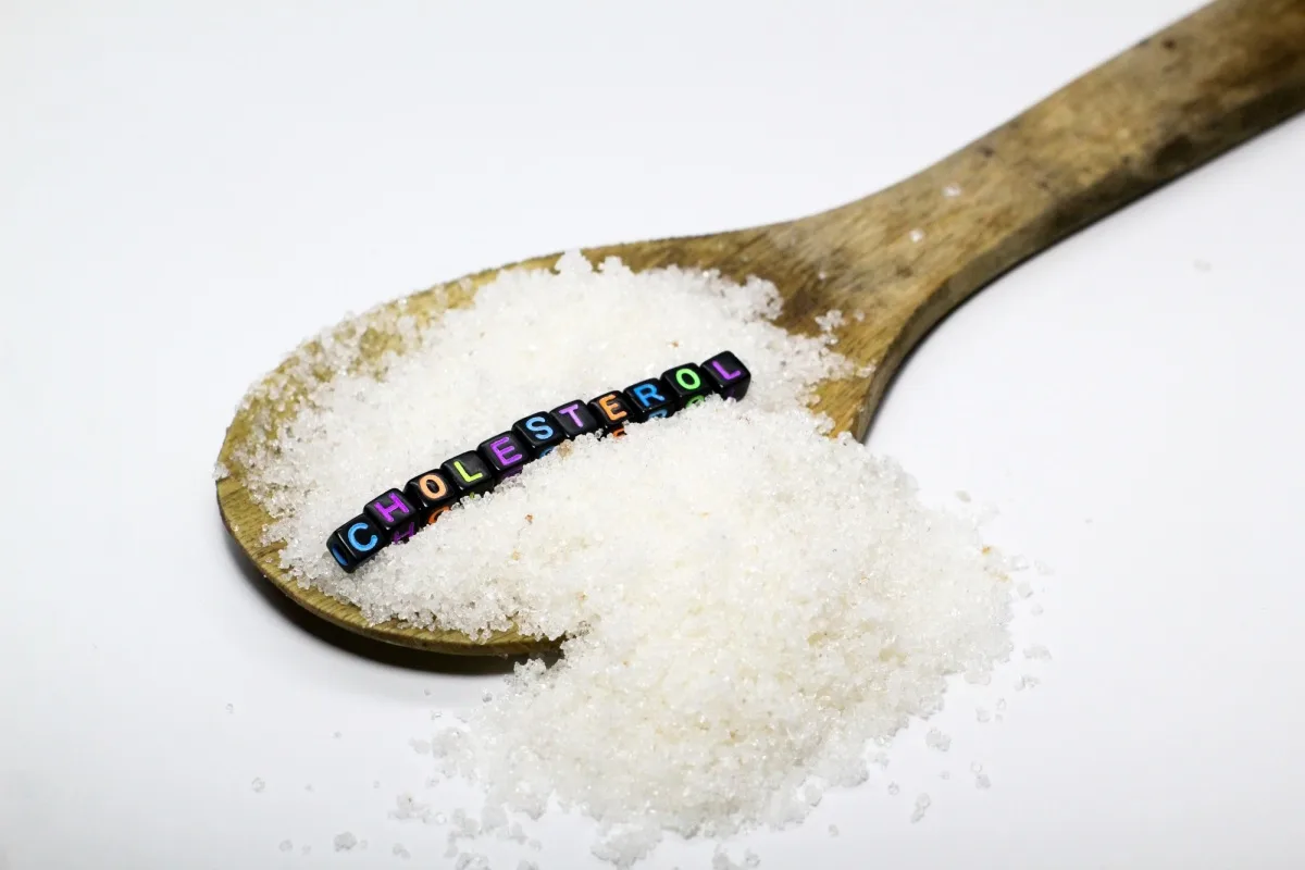 sucre dans une bouffée avec le mot cholestérol.