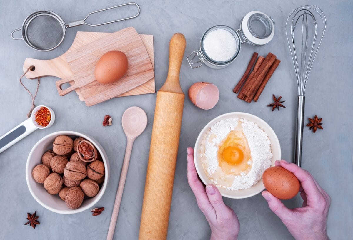 Top view of pastry chef's workplace makes dough for pie